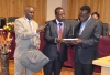 CS MOEST Prof Jacob Kaimenyi receives TCTP 29 Training module from the Director CEMASTEA after the official launch of the training